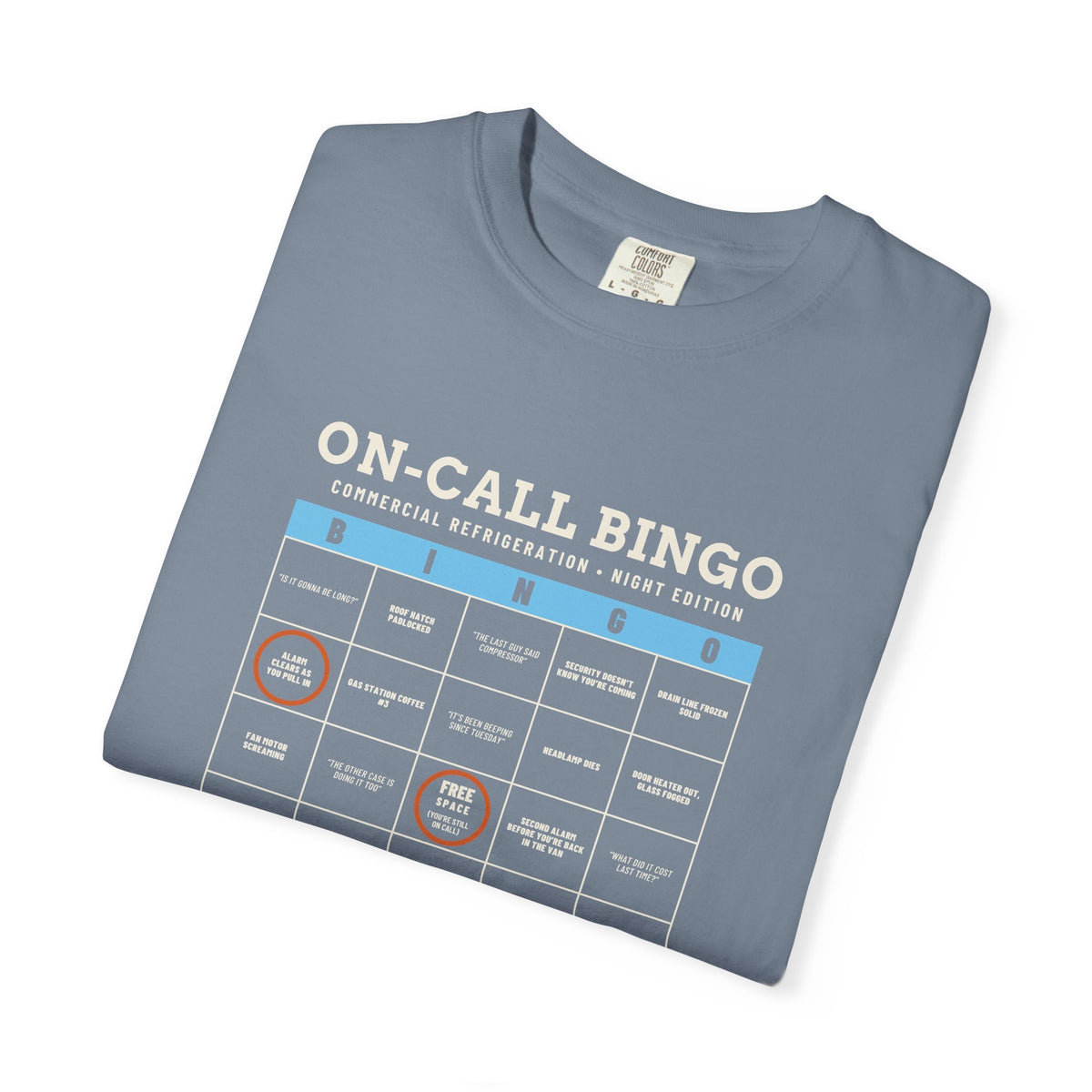 Folded Blue Jean t-shirt with an On-Call Bingo card for refrigeration night calls
