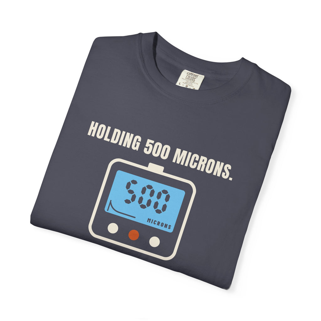 Folded navy t-shirt reading Holding 500 Microns. Unlike My Patience. with a vacuum gauge graphic