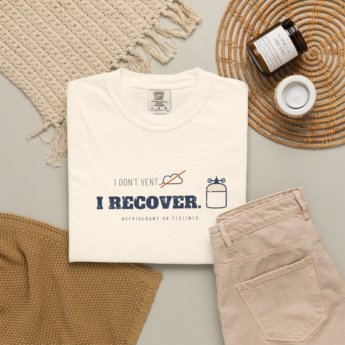 Ivory t-shirt flat-lay with the I Don't Vent. I Recover. recovery cylinder graphic