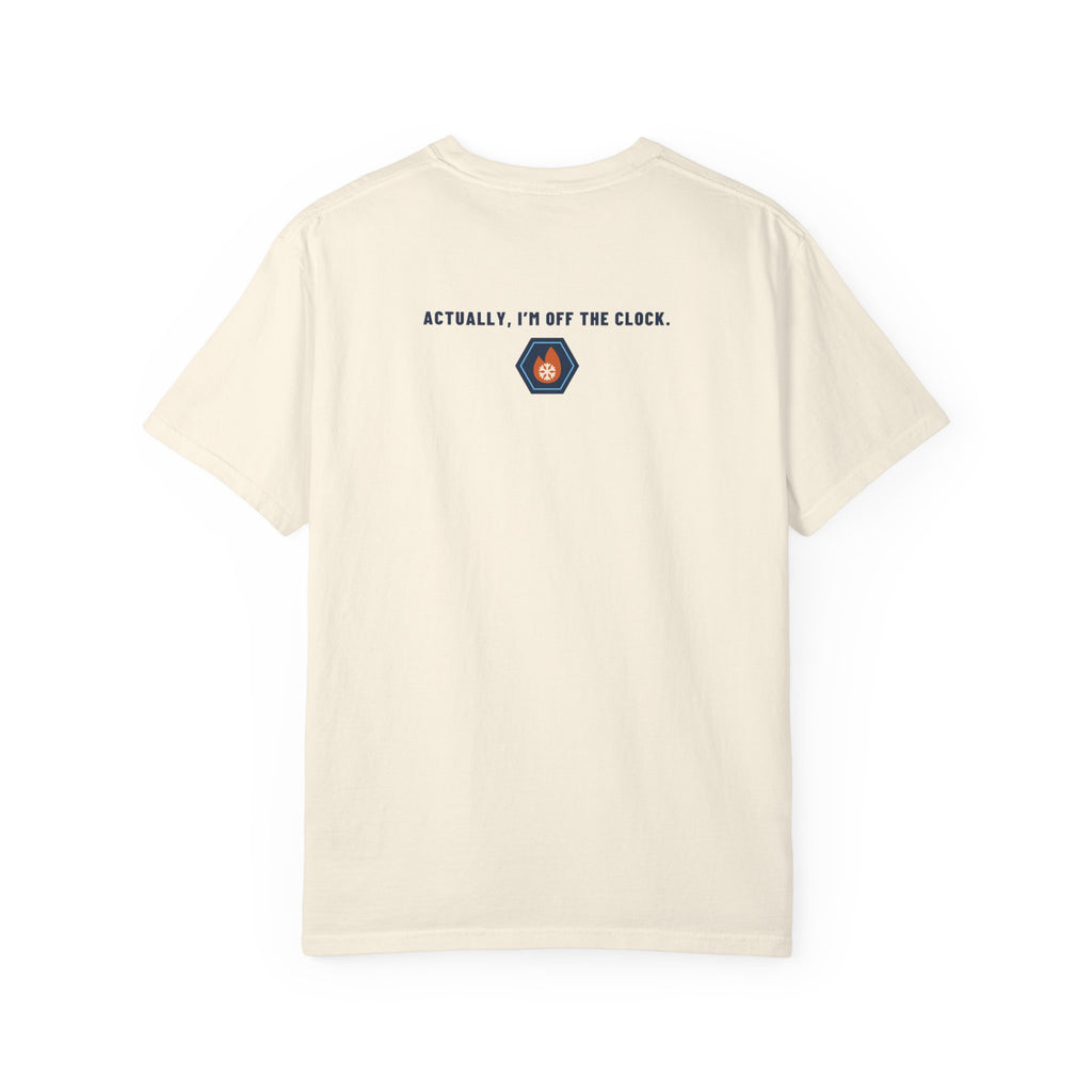 Back of ivory t-shirt reading Actually, I'm Off the Clock with a small fire-and-ice hex nut logo