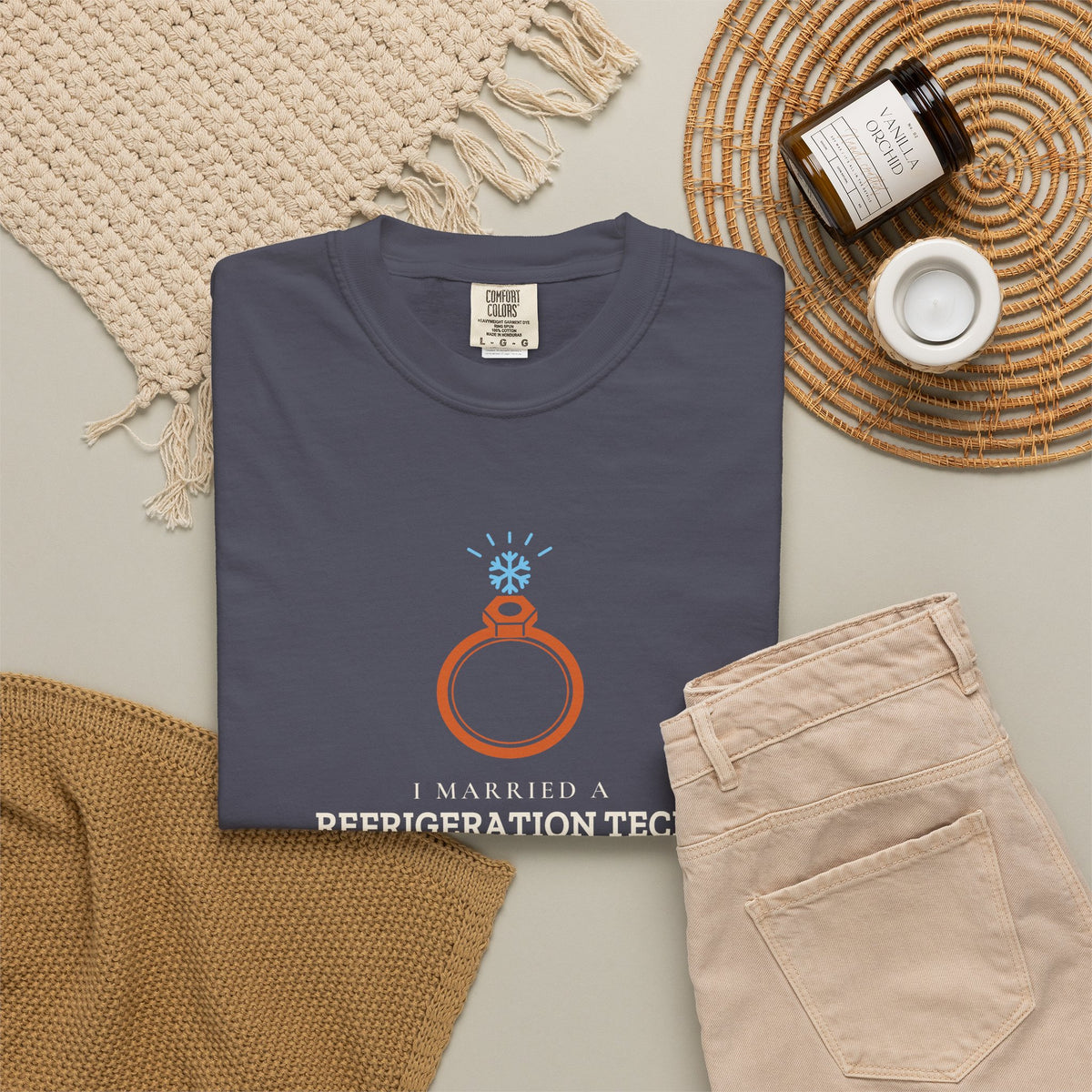 Navy t-shirt flat-lay with the I Married a Refrigeration Tech flare nut ring graphic