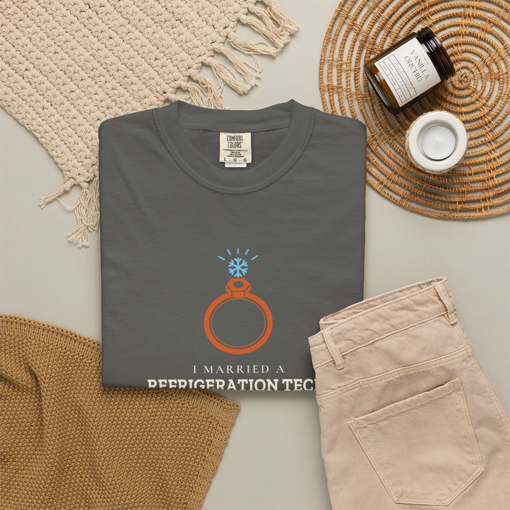 Faded black t-shirt flat-lay with the I Married a Refrigeration Tech flare nut ring graphic