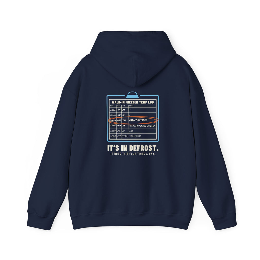 Navy hoodie, back view, with a walk-in freezer temp log and It's In Defrost