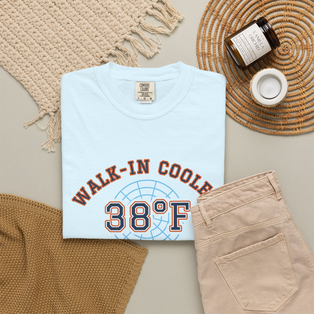 Folded Chambray t-shirt with a walk-in cooler door badge reading Walk-In Cooler Crew, Box Temp 38°F