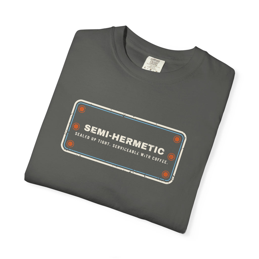 Folded Faded black t-shirt with SEMI-HERMETIC on a bolted cylinder head plate
