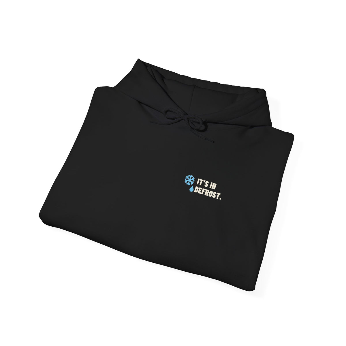 Folded Black hoodie with a small It's In Defrost line on the left chest