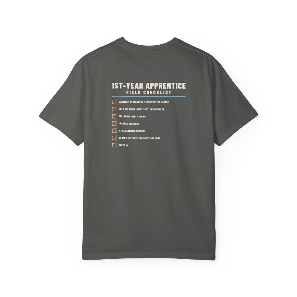 Faded black t-shirt, back view, with a 1st-Year Apprentice Field Checklist