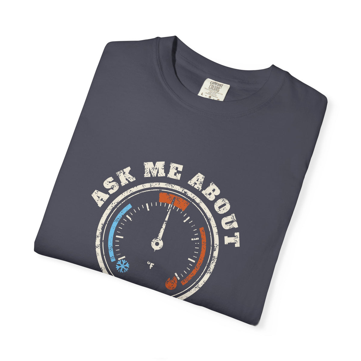 Folded navy t-shirt with a retro gauge graphic and the words Ask Me About My Superheat across the chest