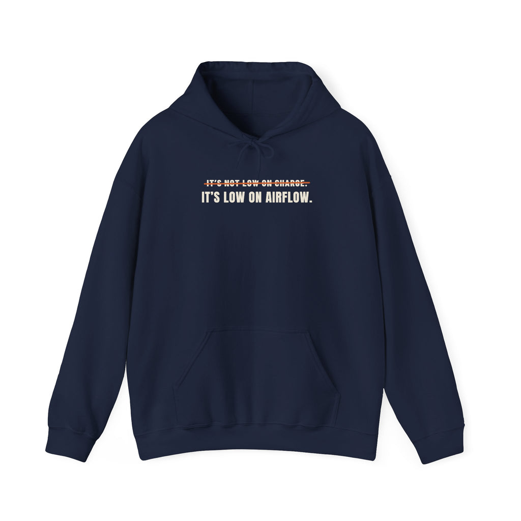 Navy hoodie reading It's Not Low on Charge, struck through, then It's Low on Airflow across the chest