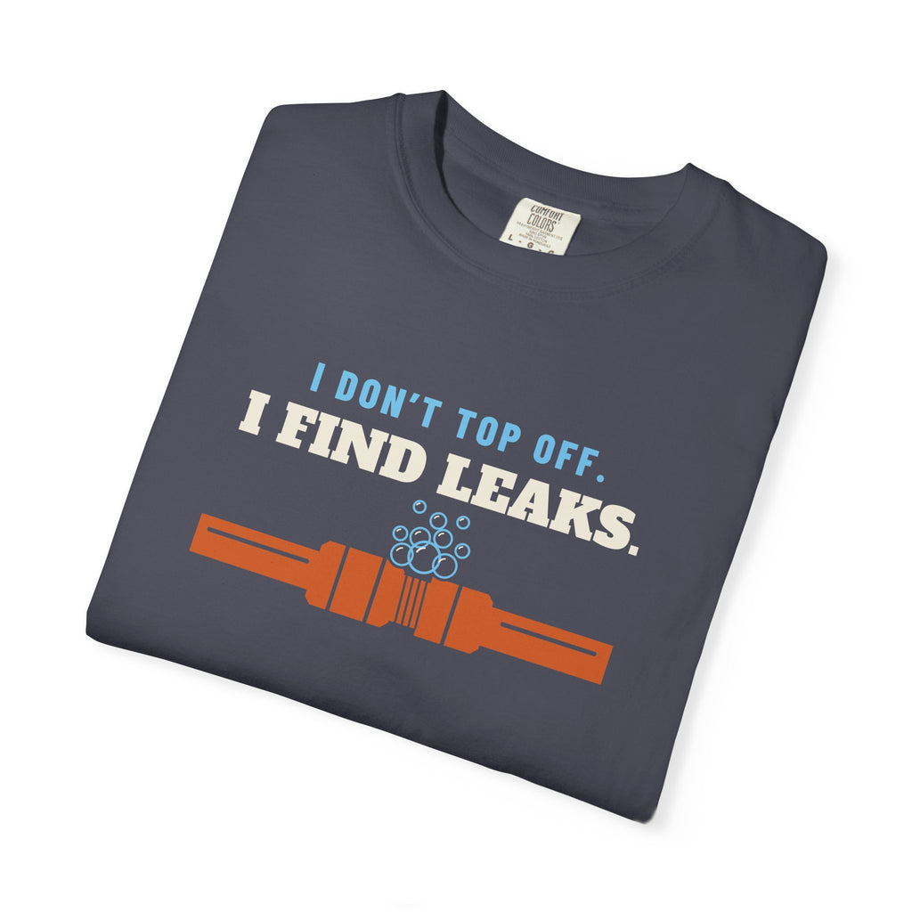 Folded navy t-shirt reading I Don't Top Off. I Find Leaks. with leak-check bubbles foaming off a flare fitting