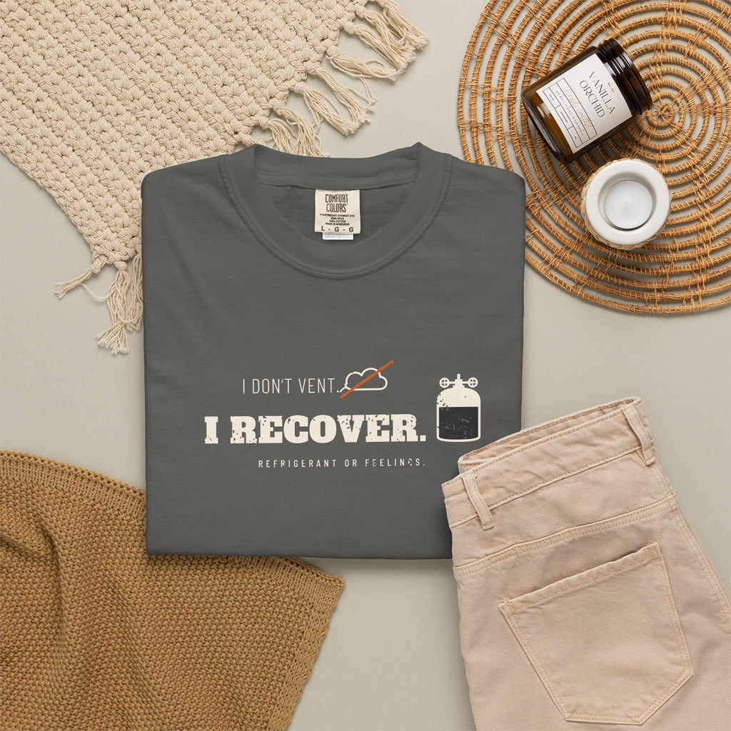 Faded black t-shirt flat-lay with the I Don't Vent. I Recover. recovery cylinder graphic