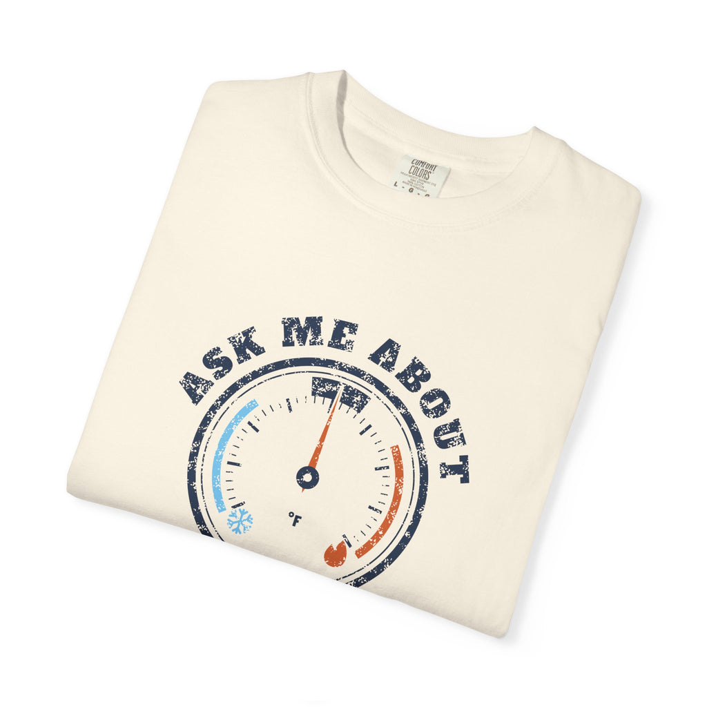 Folded ivory t-shirt with a retro gauge graphic and the words Ask Me About My Superheat across the chest