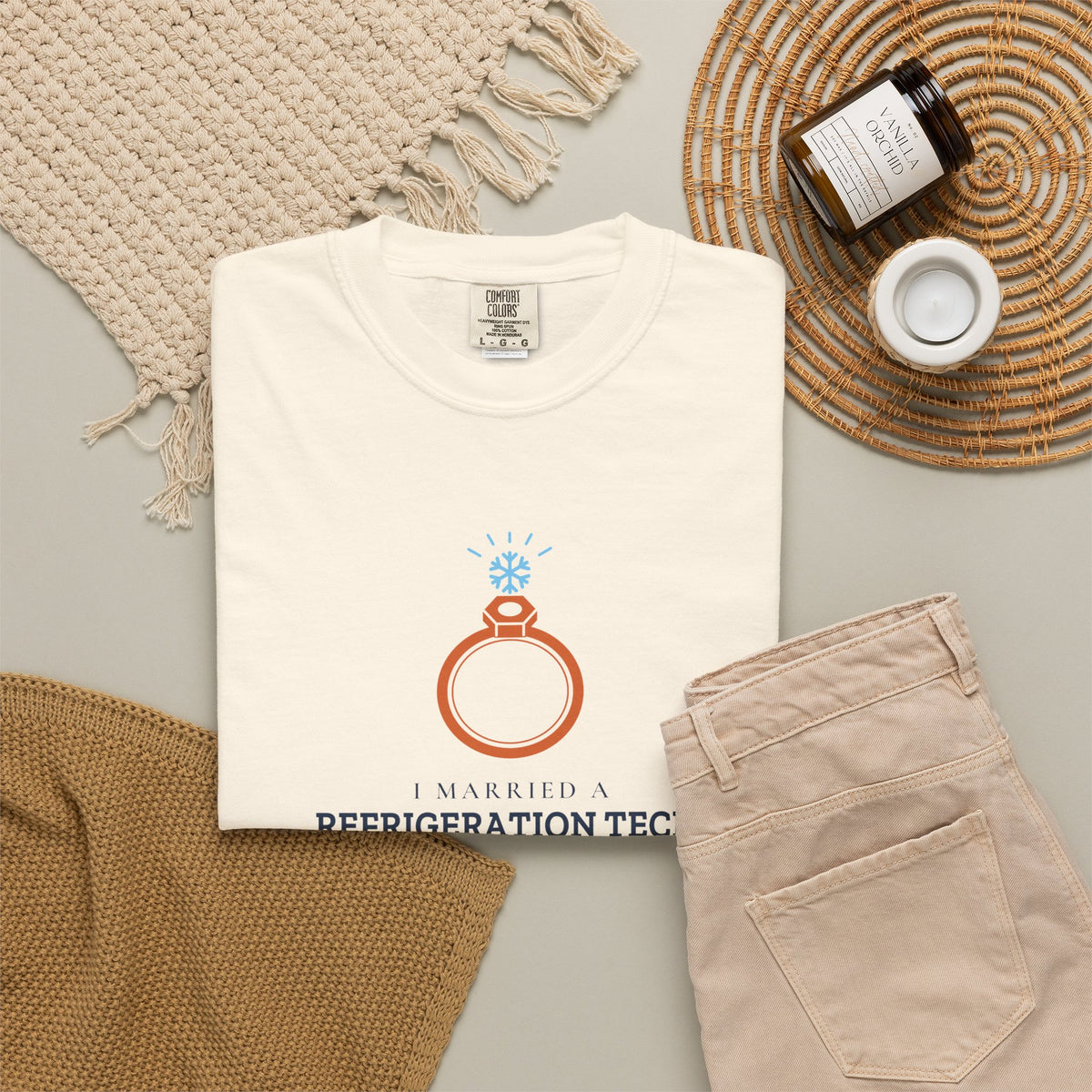 Ivory t-shirt flat-lay with the I Married a Refrigeration Tech flare nut ring graphic