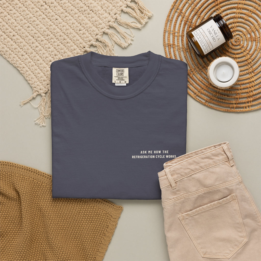 Navy t-shirt flat-lay with Ask Me How the Refrigeration Cycle Works on the left chest
