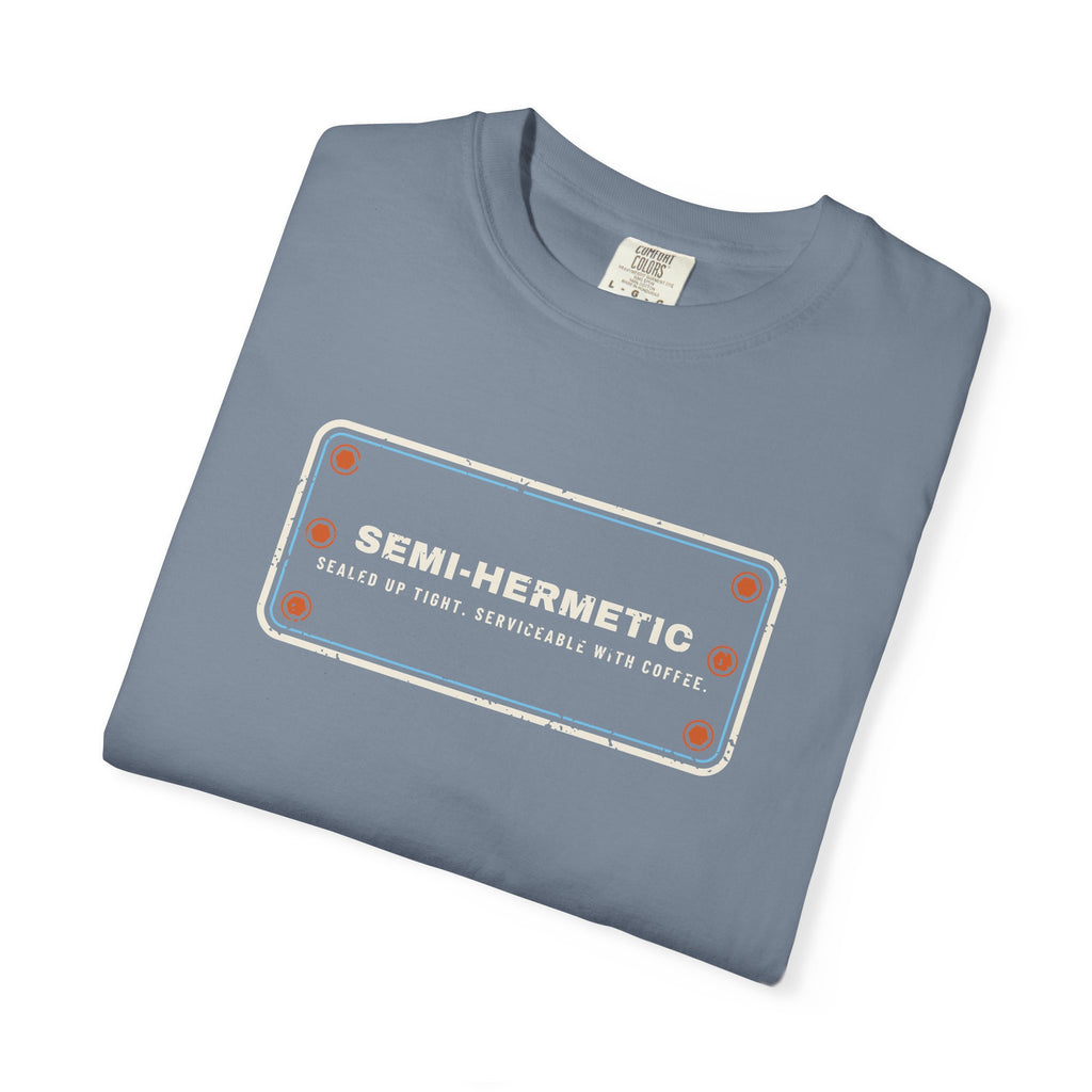 Folded Blue Jean t-shirt with SEMI-HERMETIC on a bolted cylinder head plate