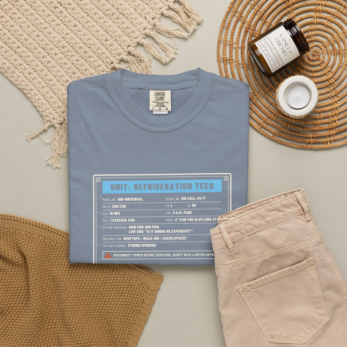 Blue Jean t-shirt flat-lay with a refrigeration tech data plate graphic
