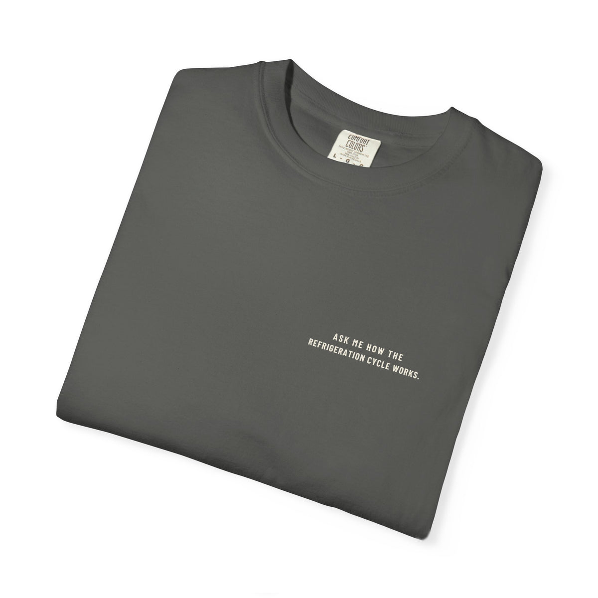 Folded Faded black t-shirt with Ask Me How the Refrigeration Cycle Works on the left chest