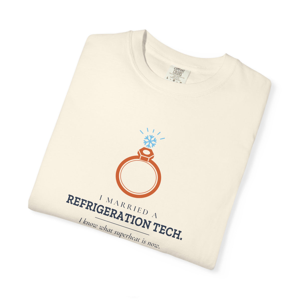 Folded Ivory t-shirt with the I Married a Refrigeration Tech flare nut ring graphic