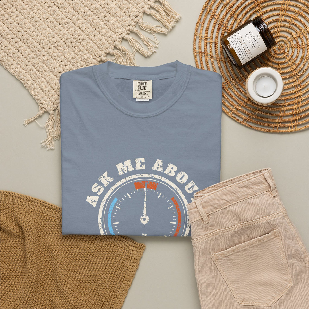 Folded Blue Jean t-shirt with a retro gauge graphic and the words Ask Me About My Superheat across the chest