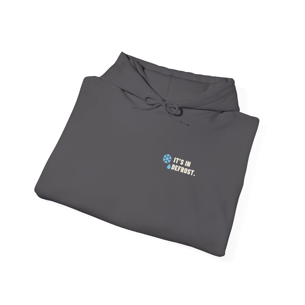 Folded Charcoal hoodie with a small It's In Defrost line on the left chest