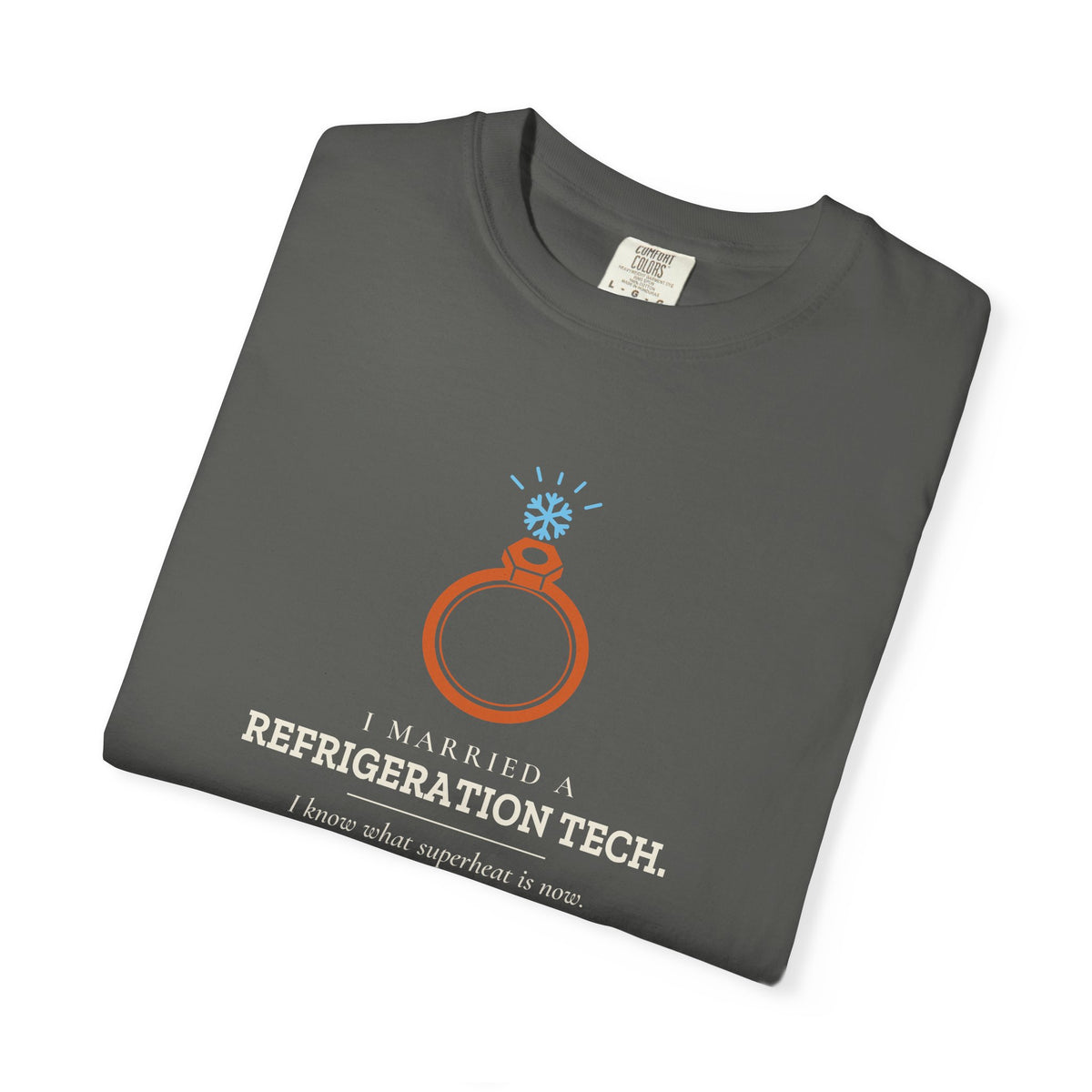 Folded Faded black t-shirt with the I Married a Refrigeration Tech flare nut ring graphic